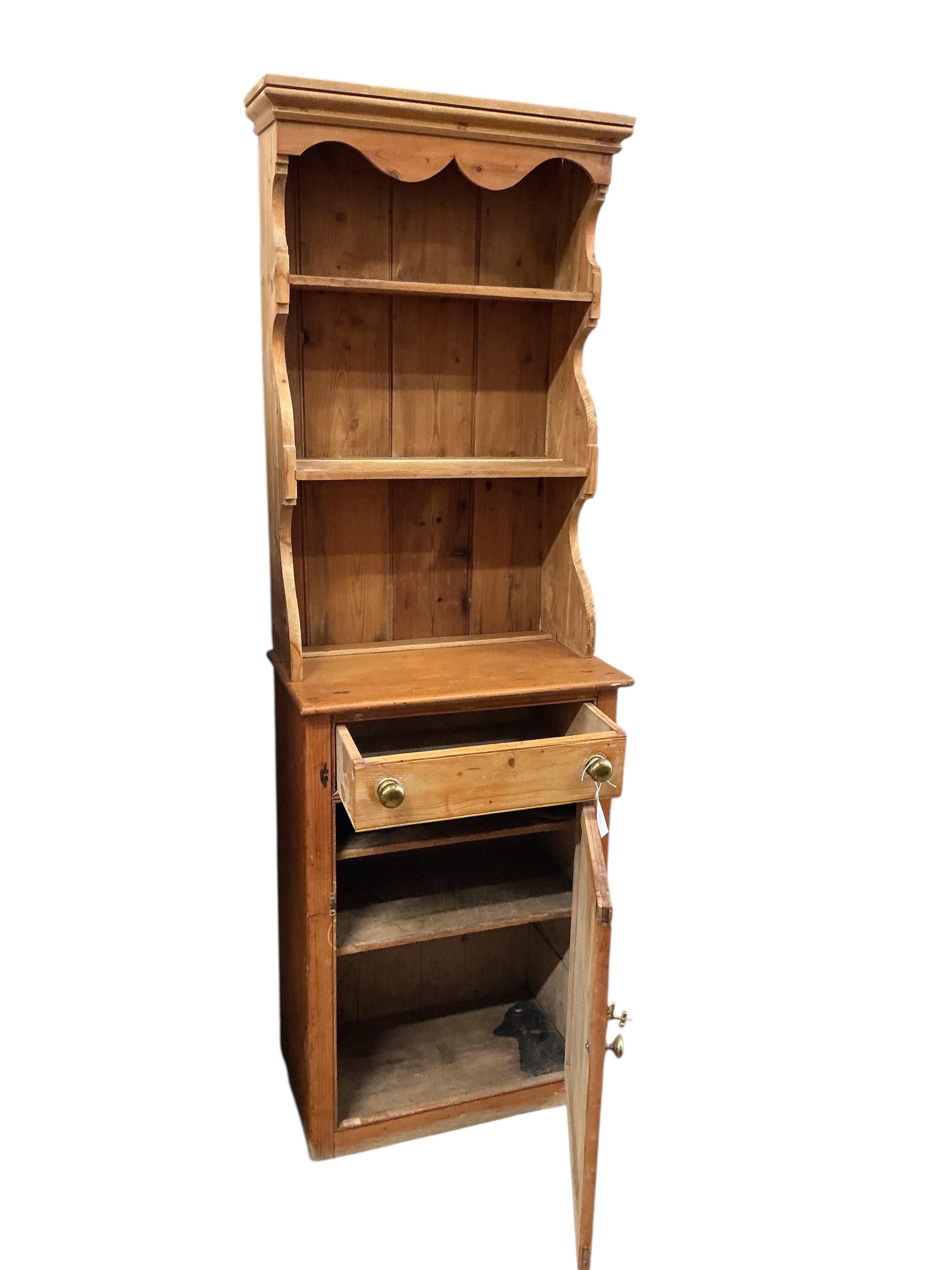 A small Victorian style pine dresser, width 59cm, depth 36cm, height 179cm